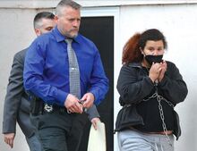 Angelica Rivera, right, is taken from the Berwick Police station by Reagan Rafferty, left, and Greg Martin Wednesday afternoon. The pregnant woman is charged with homicide in the death of baby daughter Amara.