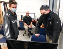 Toby Reed, at left in photo above, is a senior at Central Columbia. Here, he talks with teachers Scott Osborne, center, and E.J. Smith at the high school. Reed has been splitting time between the classrooms at Central and the medical imaging department at Geisinger Medical Center.