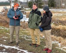 Jared Ressler, left, and Jason Fellon of the Department of Environmental Protection talk with Columbia County Conservation District manager Nancy Corbin near the Bloomsburg Recycling Center on Tuesday afternoon. The conservation district has received a $245,000 grant to help with Kinney Run flooding