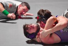 Central Columbia’s Greyson Shaud, top, pins Shamokin’s Corey Adams in 1 minute, 2 seconds, during a Thursday 189-pound match at Central Columbia. 