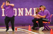 Danville’s Nate Lysiak, left, reacts to the crowd after his roll as his teammates cheer him on during the bocce match against Southern Columbia at Danville. 