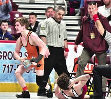 Benton’s Dylan Granahan reacts after a dramatic win over Faith Christian Academy's Chase Hontz in a 126-pound, first-round bout Thursday at the PIAA Class 2A Wrestling Championships in Hershey.