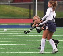 Benton’s Mylee Retherford, left, sends a pass by Northwest’s Ashlyn Hermanofski during the second quarter of Monday afternoon’s game at Northwest. The Rangers won, 2-1.