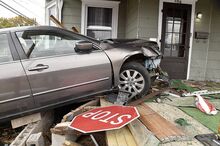 A car driven by 18-year-old Jose Jimenez ended up on the porch of a home at the intersection of Fowler Avenue and East Eighth Street in Berwick on Wednesday afternoon. Jimenez said he was trying to avoid hitting a car stopped in the intersection.