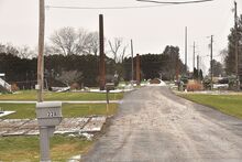 Residents in a neighbor in Briar Creek are putting up with muddy roads and wooden pallets lying in their yards as PPL upgrades a 69kV transmission line.