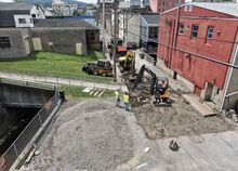 Crews are digging up about a 60 foot section of Jacobs Alley in Danville to reconstruct the roadway and do improvements to the bridge deck over Sechler Run Wednesday.