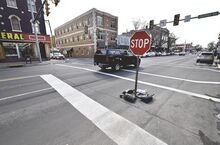 Temporary stop signs were set up Monday along Main and Center streets in Bloomsburg. Power to the traffic light there was cut after a PPL crew discovered a bad wire. Bloomsburg Public Works Director John Fritz expected it would be fixed by today.