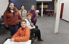 Shown in the new space for the For the Cause Teen Center in Bloomsburg are, from left, seated, Oscar Schell-McGaw, board member; and Milo Schell-McGaw, board secretary. Standing are Danielle Pearson, Teen Center director; Teresa Peters, For the Cause regional director; and Adrienne Mael, president/CEO, Susquehanna Valley United Way. The spot is to open next month at 36 E. Main St. in Bloomsburg