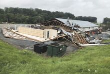 Damage to Hilly Ridge Sales and Service along Route 54 in Rush Township is shown. Manager Daryl Seibel said the roof of the main showroom blew off during Saturday night's storm. The family-owned business is closed but will rebuild, he said.