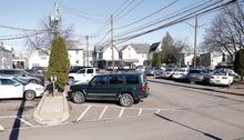 A parking lot at East Pine and Miller avenues is shown Tuesday in Bloomsburg. It's one of three lots the town plans to redesign, mill and repave before students return in the fall.