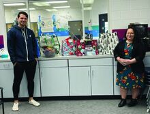 Bloomsburg YMCA Health & Wellness Director Collin Benfield and Alicia Lindenmuth are pictured with the gifts from the Grandparents Raising Grandchildren drive. This was the second time the Bloomsburg Y has partnered with the Salvation Army Service Center to give back to the community.